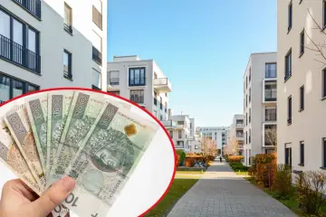 Pieniądze na przelew za podatek od nieruchomości. Nowoczesne osiedle mieszkaniowe.