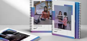 Notebooks with "Retail Starts Here," "Leadership Starts Here," and "Product Training Starts Here" for board meeting materials.
