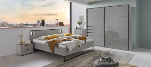 Graues Bett im Schlafzimmer - So wirkt es warm & stilvoll