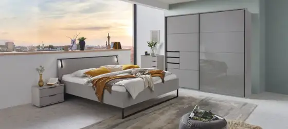Graues Bett im Schlafzimmer - So wirkt es warm & stilvoll