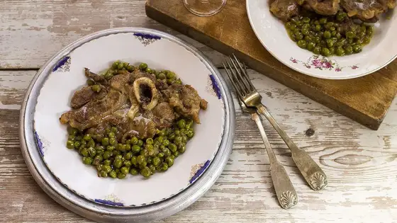 Ossobuco con piselli - La ricetta per un piatto tenero e saporito