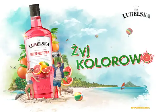 Lubelska litr grejpfrutowa na plaży, z ludźmi tańczącymi i balonami na niebie. Żyj kolorowo!