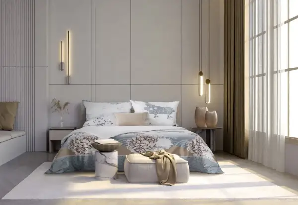 Elegancka sypialnia w stylu hotelowym z łóżkiem, ozdobnym pledem i nowoczesnymi lampami.