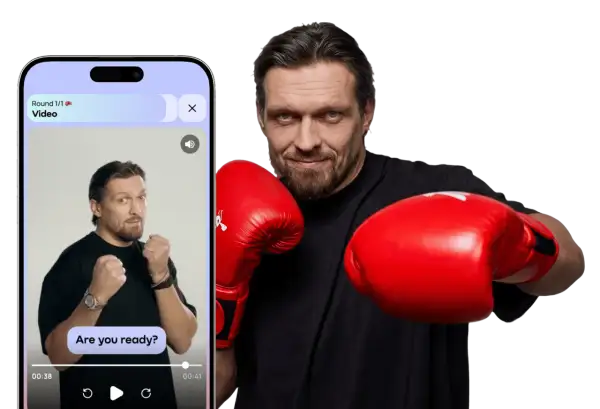 A boxer in red gloves, ready to throw down. The phone screen shows a video with the text "Are you ready?" - a real knockout!