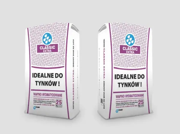 Dwie torby wapna hydratyzowanego Classic Extra, idealne do tynków. Zastosowanie tego produktu gwarantuje trwałość i zdrowy dom na lata.