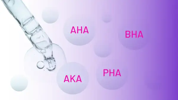 Kropla serum z pipety zawiera różne rodzaje kwasów: AHA, BHA, AKA i PHA.
