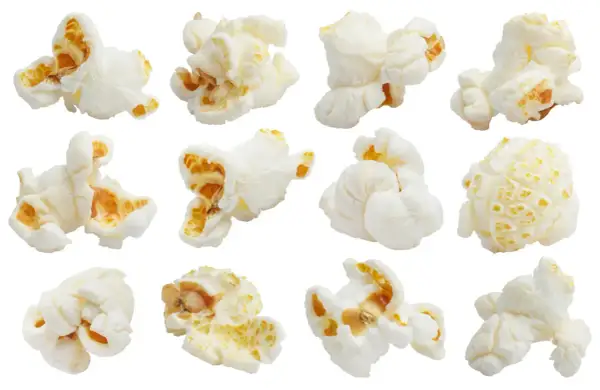 Dodici chicchi di popcorn soffici e bianchi, pronti per essere gustati. Attenzione alle calorie!