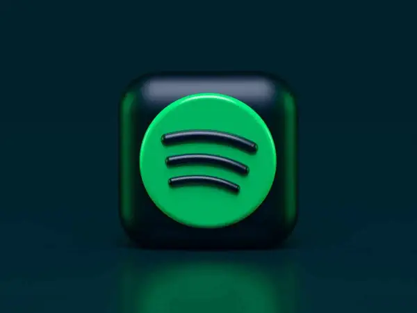 Ikona Spotify na ciemnym tle.