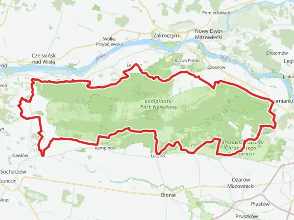Mapa przedstawia przebieg kampinoskiego szlaku rowerowego, otaczającego zielony obszar Kampinoskiego Parku Narodowego, w pobliżu Wisły i miejscowości takich jak Zakroczym czy Nowy Dwór Mazowiecki.