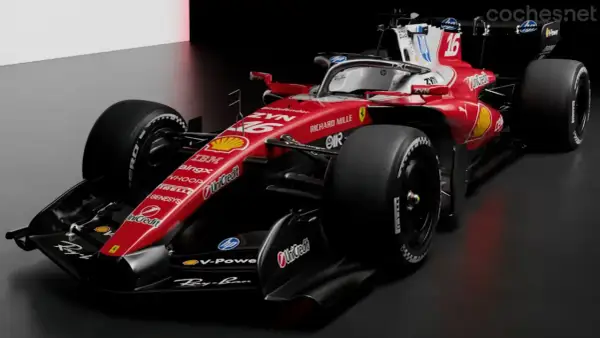 El monoplaza de Fórmula 1 Ferrari, con su icónico rojo y patrocinadores, listo para la velocidad.