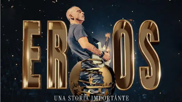 Eros Ramazzotti mit Gitarre, umgeben von goldenen Buchstaben und einer Weltkugel. Ankündigung der Eros Ramazzotti Tour 2026.
