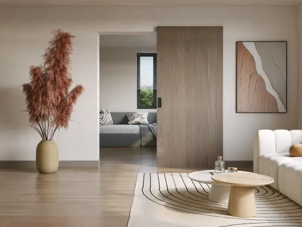 Puerta corredera de madera, ideal para poner puerta corredera sin obra. Un salón moderno con sofá y mesa de centro.