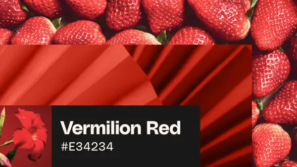 Juicy strawberries and a vibrant vermilion red flower, showcasing the rich hue.