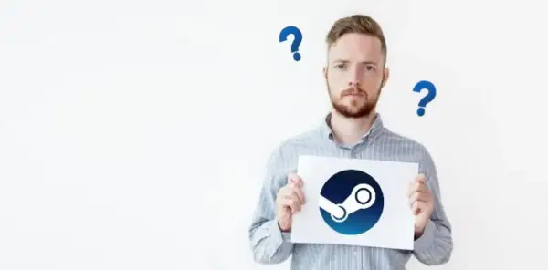Mężczyzna trzyma kartkę z logo Steam, otoczony znakami zapytania.