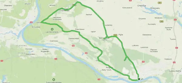 Mapa z zaznaczonymi trasami rowerowymi wokół Torunia, prowadzącymi przez malownicze tereny i w pobliżu zamku.