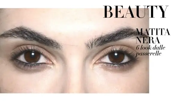 Occhi con un look grunge makeup, evidenziati da matita nera e ciglia folte.