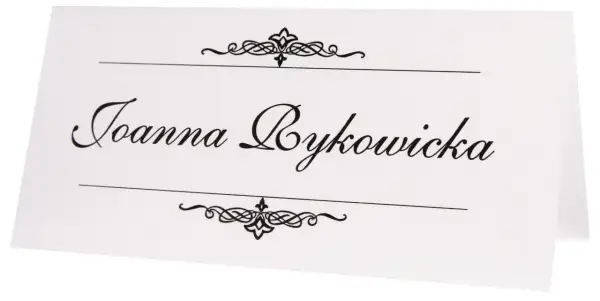 Elegancka winietka z imieniem "Joanna Bykowicz" ozdobiona ornamentami. Idealna inspiracja, jak zrobić winietki na przyjęcie.