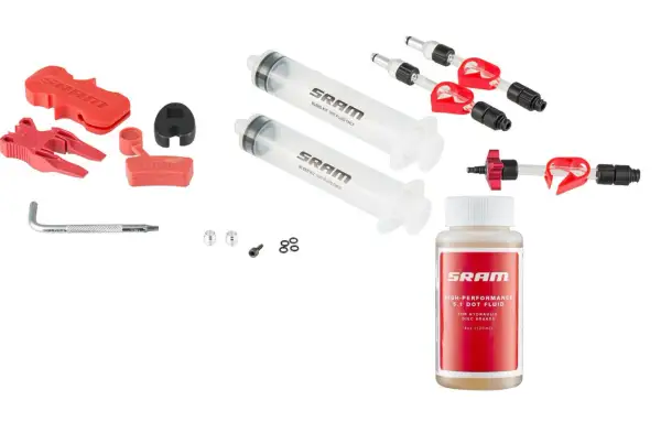Kit pour purge liquide de frein SRAM : seringues, adaptateurs, clé Allen et flacon de DOT 5.1.