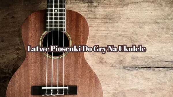 Drewniane ukulele z napisem "Łatwe piosenki do gry na ukulele". Idealne do nauki prostych melodii.