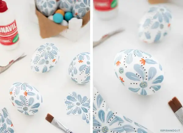 Lavoretti uova di polistirolo decorate con fiori azzurri e arancioni, pronte per Pasqua.