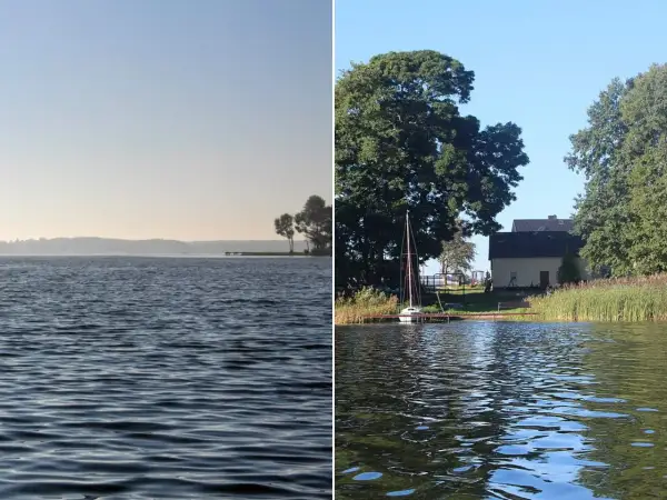 Spokojne jezioro Urszulewskie z łódką przy pomoście i domkiem w tle.