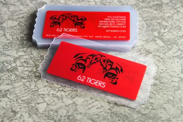 Bold red business cards with tiger eye graphics and "62 Tigers" text. Great business cards ideas for a fierce brand.