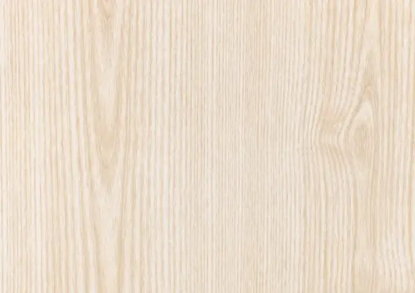 Texture naturelle de couleur bois frêne, aux veines fines et claires, évoquant la douceur et la pureté.