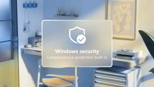 Jasne, oto opis alternatywny:

Biurko z komputerem i grafiką "Windows security". Chcesz wiedzieć, jak wyłączyć Windows Defender?