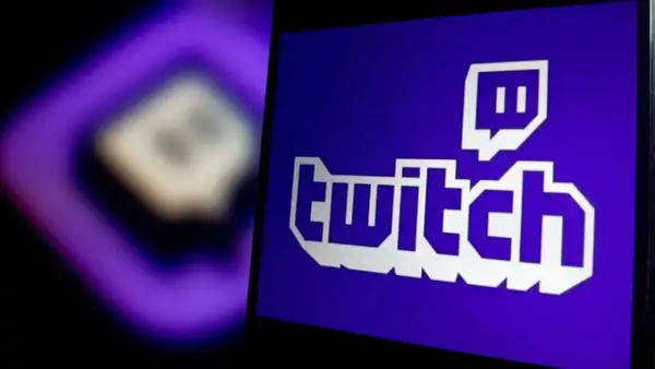 Das Twitch-Logo auf einem violetten Hintergrund. Was bedeutet "kek"? Das ist ein Ausdruck aus der Gaming-Welt, oft auf Twitch verwendet.