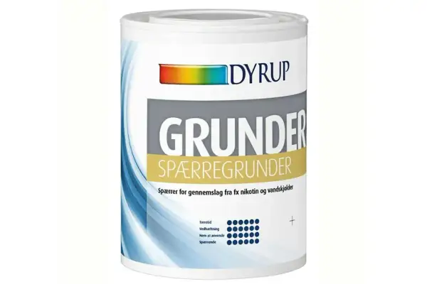 En burk med DYRUP SPÆRREGRUNDER, en primer grundfärg som blockerar fläckar från nikotin och vatten.