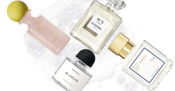 Perfumy Maison Francis Kurkdjian 724, Chanel N°5 L'Eau, Byredo Blanche i La Perla Invisible Touch na tle bąbelków.