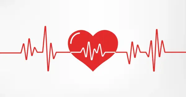 Czerwone serce z linią EKG, symbolizujące zdrowe, choć czasem wysokie tętno.