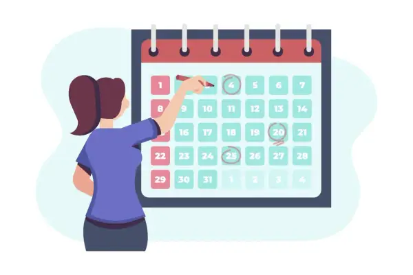 Donna segna sul calendario i turni di lavoro su 6 giorni, pianificando le giornate.