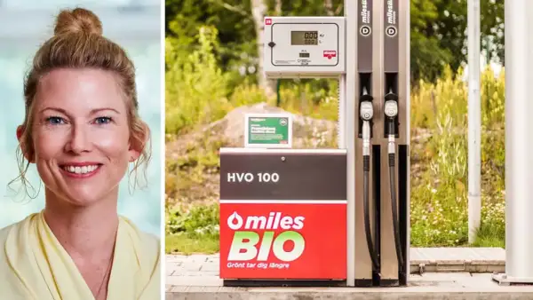 Kvinna ler bredvid en pump för HVO 100, framtidens drivmedel. Miles BIO – grönt tar dig längre.