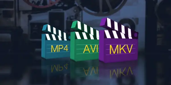Three clapperboards labeled MP4, AVI, and MKV stand in a row, reflecting on a dark surface.