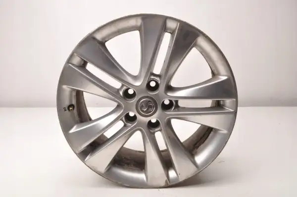Srebrna felga aluminiowa do Opla Astry J. Rozstaw śrub 5x115.