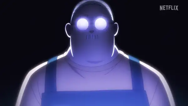 Ein Mann mit leuchtenden Augen und Schnurrbart, der eine Latzhose trägt. Möglicherweise ein Charakter aus Sakamoto Days Staffel 2.