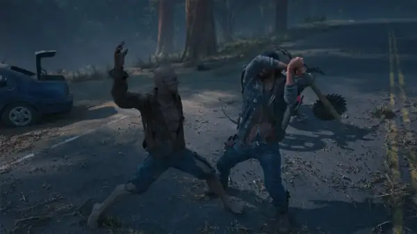 Deacon walczy z Freakerem na drodze, jak w poradniku Days Gone.