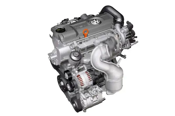 Nowoczesny silnik diesla Volkswagena z turbosprężarką i alternatorem.