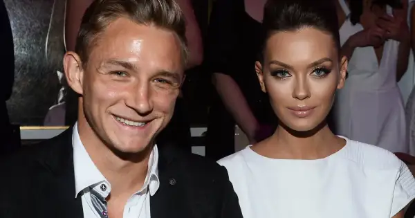 Uśmiechnięci Edyta Zając i Rzeźniczak na evencie.