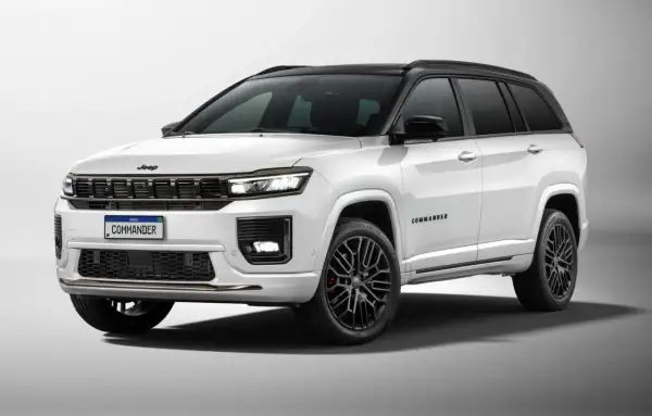 Biały Jeep Commander z czarnym dachem i przyciemnianymi szybami, na czarnych felgach. Limitowana edycja tego SUV-a prezentuje się imponująco.