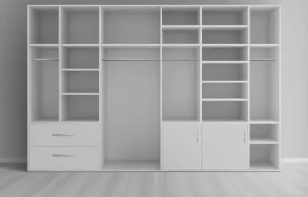 Un placard profond blanc avec étagères, penderies et tiroirs, idéal pour aménager un espace de rangement optimisé.