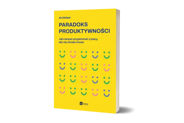 Okładka książki "Paradoks Produktywności" Ali Abdaala. Żółte tło z rzędami uśmiechniętych buziek.