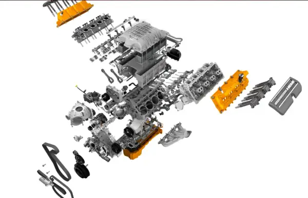 Rozłożony silnik Hellcat z pomarańczowymi elementami i napisem "SUPERCHARGED HEMI".