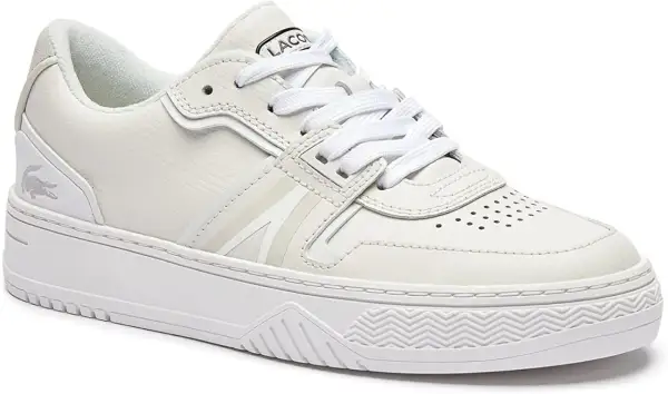 Sneaker Lacoste blanche, style décontracté, taille 3. Le logo du crocodile est discret sur le côté.