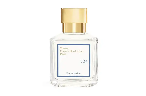 Elegancka butelka perfum Maison Francis Kurkdjian 724 z złotą nakrętką.