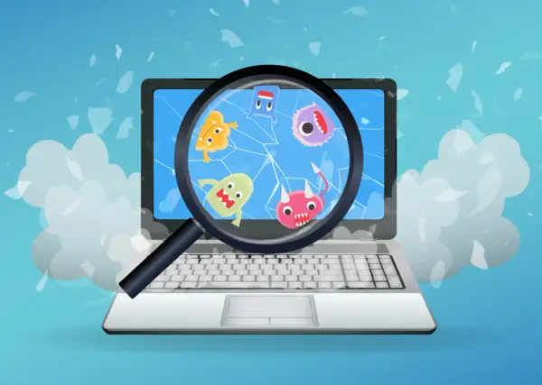 Laptop z kolorowymi potworkami na ekranie, powiększonymi przez lupę. Dowiedz się, jak usunąć wirusa z komputera i pozbyć się tych intruzów.