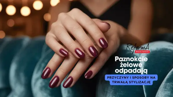 Dłonie z bordowymi paznokciami żelowymi. Dowiedz się, dlaczego żel odchodzi od wolnego brzegu i jak temu zapobiec.