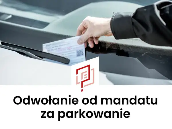 Dłoń umieszcza dokument pod wycieraczką. To odwołanie od mandatu za parkowanie.