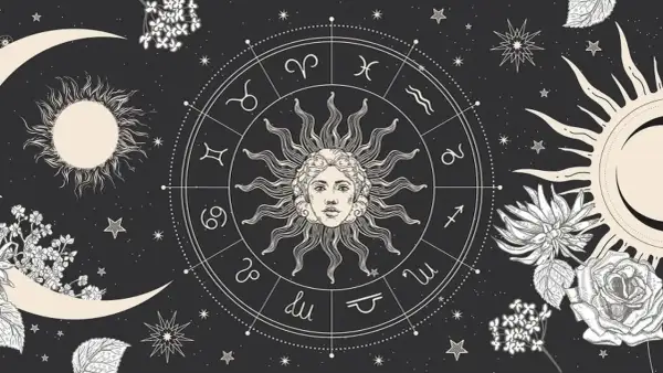 Zodiakalny krąg z twarzą Słońca w centrum, otoczony symbolami i księżycem. To obraz, który przywołuje żywioł ziemi i kosmiczne tajemnice.